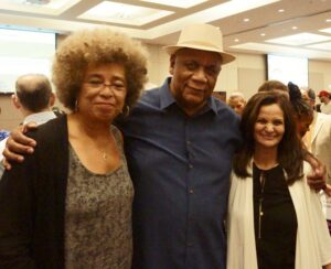 Angela Davis, Frank Chapman of CAARPR, and Rasmea at support event keynoted by Davis