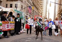 New York protest salutes Ahed Tamimi at “Fearless Girl” statue