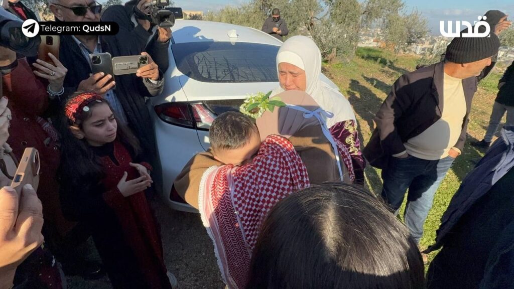 Liberated prisoner Nidaa Saleh al-Zughaibi embraces her family in Kufr Dan upon her release in Toufan al-Ahrar
