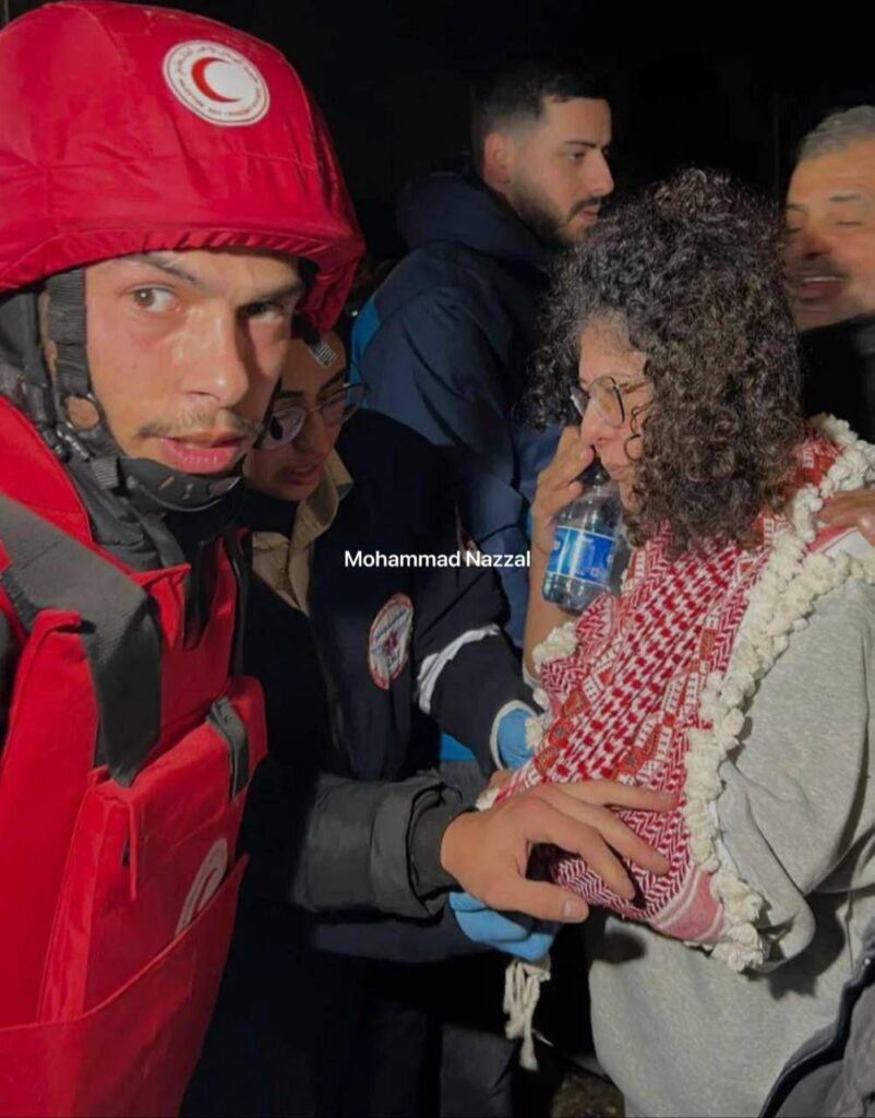 Liberated Red Crescent worker Margaret al-Rai, with a broken hand after she was assaulted by occupation forces